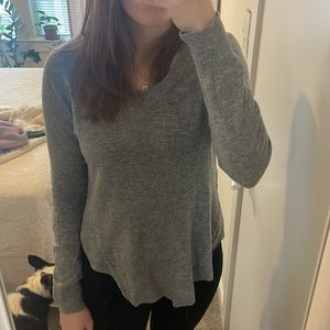 Gray sweater with shirttail hem